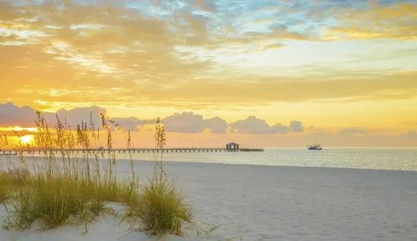 Serene Mississippi Gulf Coast sunset — the inspiration behind MerLeaux